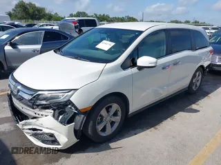 2018 Honda Odyssey EX with VIN 5FNRL6H57JB100035, listed as a IAAI auction lot 42582758 with 88,585 mi miles and . Bid and sale history available at DreamBid. Image 2.