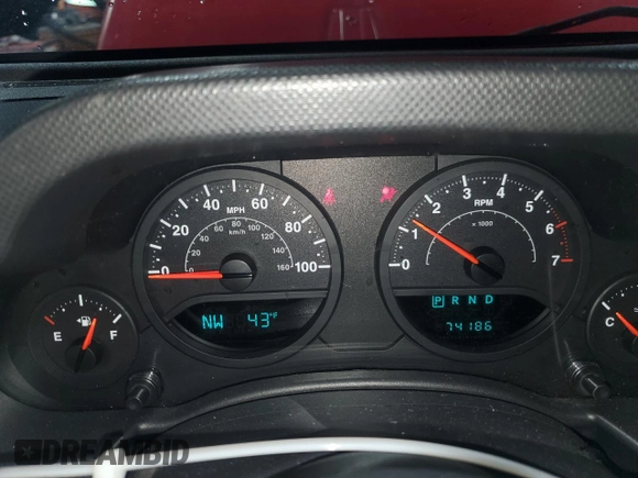 2008 Jeep Wrangler X with VIN 1J4FA24118L501599, listed as a Copart auction lot 52776475 with 74,186 mi miles and Salvage Title. Bid and sale history available at DreamBid. Image 9.