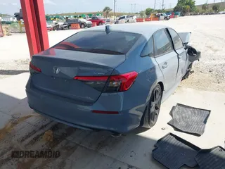 2022 Honda Civic Sport with VIN 2HGFE2F53NH561551, listed as a IAAI auction lot 41865892 with 24,011 mi miles and . Bid and sale history available at carsss.com. Image 4.