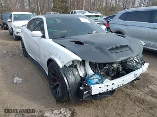 2021 Dodge Charger SRT Hellcat Widebody with VIN 2C3CDXL92MH585934, listed as a IAAI auction lot 41387883 with 20,873 mi miles. Bid and sale history available at carsss.com. Image 1.
