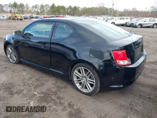 2011 Scion tC with VIN JTKJF5C74B3014552, listed as a IAAI auction lot 42004369 with 232,588 mi miles. Bid and sale history available at carsss.com. Image 3.