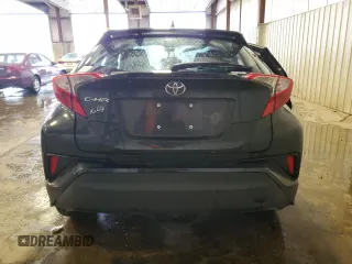 2018 Toyota C-HR XLE z VIN NMTKHMBX0JR041387, wystawiony jako Copart lot #57050385 z przebiegiem Nie podano mil oraz Szkody całkowita. Historia ofert i sprzedaży dostępna na DreamBid. Obrazek 6.