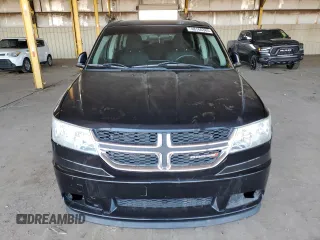 2013 Dodge Journey SE with VIN 3C4PDCAB4DT575943, listed as a Copart auction lot 48760385 with 127,081 mi miles and Salvage Title. Bid and sale history available at carsss.com. Image 5.