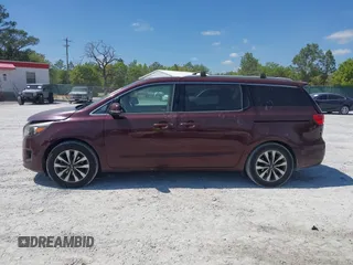 2015 Kia Sedona EX with VIN KNDMC5C19F6018139, listed as a IAAI auction lot 42031165 with 136,484 mi miles. Bid and sale history available at carsss.com. Image 14.
