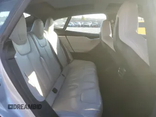 2016 Tesla Model S 90D with VIN 5YJSA1E26GF147974, listed as a Copart auction lot 82815404 with 126,609 mi miles and Salvage Title. Bid and sale history available at DreamBid. Image 11.
