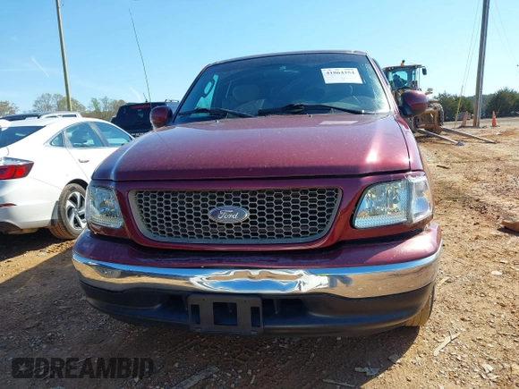 2003 Ford F-150 XL with VIN 1FTRX17W43NA07186, listed as a IAAI auction lot 41864354 with 123,565 mi miles. Bid and sale history available at carsss.com. Image 12.