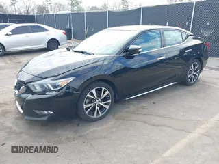 2016 Nissan Maxima SL with VIN 1N4AA6AP3GC426067, listed as a IAAI auction lot 41680265 with 102,450 mi miles and . Bid and sale history available at DreamBid. Image 2.