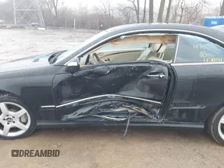 2007 Mercedes-Benz CLK-Class 5.5L with VIN WDBTJ72H77F214706, listed as a IAAI auction lot 41471332 with 87,310 mi miles. Bid and sale history available at carsss.com. Image 15.