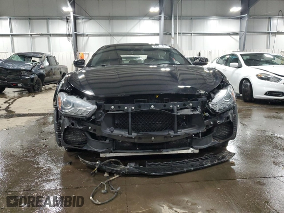 2017 Maserati Ghibli S Q4 z VIN ZAM57RTA0H1196498, wystawiony jako Copart lot #79911364 z przebiegiem 69 950 mil mil oraz Szkody całkowita. Historia ofert i sprzedaży dostępna na DreamBid. Obrazek 5.