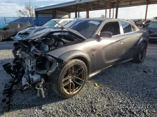 2023 Dodge Charger SRT Hellcat Redeye Widebody with VIN 2C3CDXL9XPH611488, listed as a Copart auction lot 42526075 with 56,309 mi miles and Salvage Title. Bid and sale history available at carsss.com. Image 1.