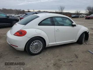 2014 Volkswagen Beetle 2.5L w/Sun with VIN 3VWJP7AT8EM621487, listed as a Copart auction lot 83106354 with 75,381 mi miles and Salvage Title. Bid and sale history available at DreamBid. Image 3.