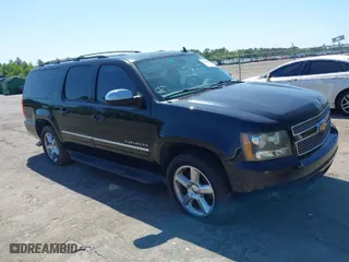2011 Chevrolet Suburban LTZ with VIN 1GNSCKE01BR275919, listed as a IAAI auction lot 42038399 with 247,841 mi miles. Bid and sale history available at carsss.com. Image 1.