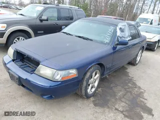 2003 Mercury Marauder with VIN 2MEHM75V33X674412, listed as a IAAI auction lot 41879734 with 181,984 mi miles. Bid and sale history available at carsss.com. Image 2.