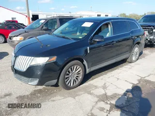 2010 Lincoln MKT with VIN 2LMHJ5AR9ABJ12211, listed as a IAAI auction lot 41766668 with 161,057 mi miles. Bid and sale history available at carsss.com. Image 2.