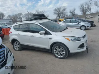 2015 Ford Escape Titanium with VIN 1FMCU9J90FUA67262, listed as a IAAI auction lot 41869583 with 161,281 mi miles. Bid and sale history available at carsss.com. Image 14.