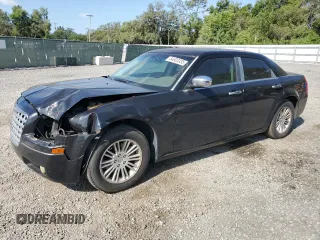 2010 Chrysler 300 Touring with VIN 2C3CA4CD1AH101159, listed as a Copart auction lot 54603335 with 209,953 mi miles and Salvage title. Bid and sale history available at DreamBid. Image 1.