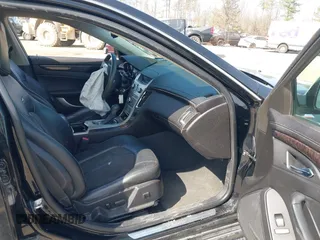 2012 Cadillac CTS Luxury with VIN 1G6DE5E56C0151579, listed as a IAAI auction lot 41717449 with 116,938 mi miles and . Bid and sale history available at DreamBid. Image 5.