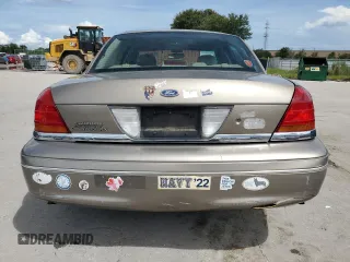 2003 Ford Crown Victoria LX с VIN 2FAHP74W63X124565, выставлен на аукционе Copart как лот 71051034 с пробегом 89 976 миль миль и Списание • Salvage title. История ставок и продаж доступна на DreamBid. Изображение 6.