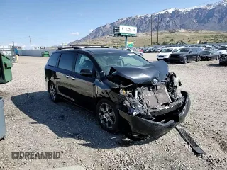 2015 Toyota Sienna SE with VIN 5TDXK3DC1FS655269, listed as a Copart auction lot 53682015 with 100,686 mi miles and Salvage Title. Bid and sale history available at DreamBid. Image 14.