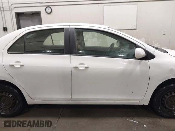 2007 Toyota Yaris with VIN JTDBT923X71058522, listed as a IAAI auction lot 42152157 with 161,050 mi miles. Bid and sale history available at carsss.com. Image 13.