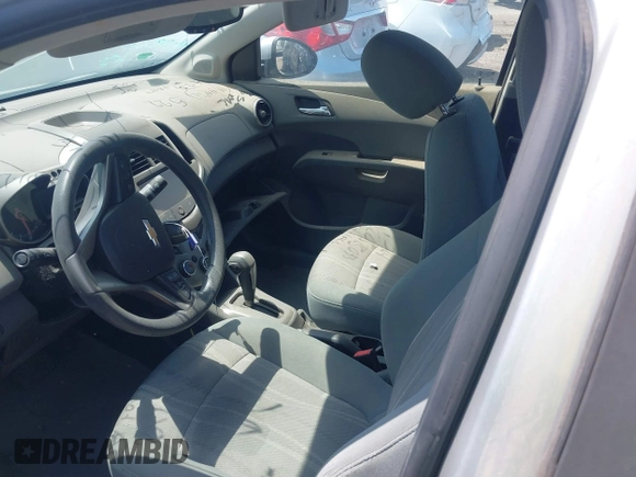2014 Chevrolet Sonic LT with VIN 1G1JC5SH1E4229324, listed as a IAAI auction lot 39945012 with Not Provided miles and . Bid and sale history available at DreamBid. Image 5.