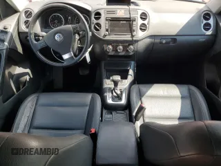 2010 Volkswagen Tiguan Wolfsburg Edition with VIN WVGAV7AX4AW003410, listed as a Copart auction lot 60645845 with 128,563 mi miles and Salvage title. Bid and sale history available at DreamBid. Image 8.