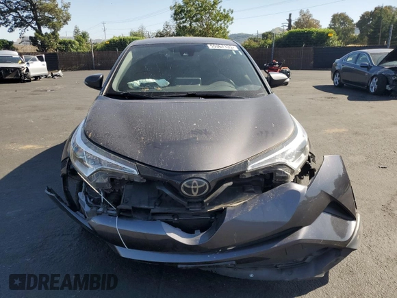 2019 Toyota C-HR XLE z VIN JTNKHMBX7K1050860, wystawiony jako Copart lot #55967135 z przebiegiem 60 330 mil mil oraz Szkoda całkowita • Salvage title. Historia ofert i sprzedaży dostępna na DreamBid. Obrazek 5.
