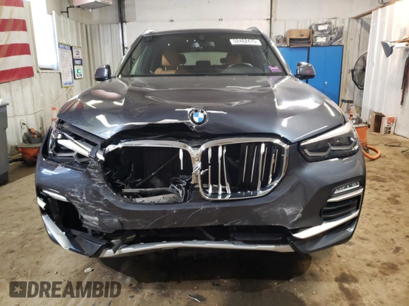 2021 BMW X5 xDrive40i with VIN 5UXCR6C06M9E05140, listed as a Copart auction lot 52402475 with 47,869 mi miles and Salvage title. Bid and sale history available at DreamBid. Image 5.