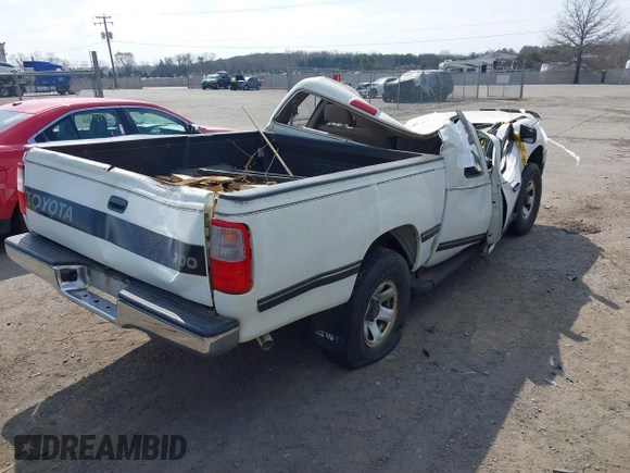 1997 Toyota T100 DX with VIN JT4UN22D9V0047212, listed as a IAAI auction lot 41801996 with 77,524 mi miles. Bid and sale history available at carsss.com. Image 4.