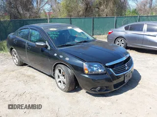 2009 Mitsubishi Galant ES z VIN 4A3AB36F99E004332, wystawiony jako IAAI lot #41977076 z przebiegiem 165 861 mil mil oraz . Historia ofert i sprzedaży dostępna na DreamBid. Obrazek 1.