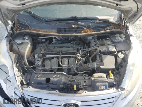 2013 Ford Fiesta S z VIN 3FADP4AJ9DM140665, wystawiony jako Copart lot #61634485 z przebiegiem 165 124 mil mil oraz Szkoda całkowita • Salvage title. Historia ofert i sprzedaży dostępna na DreamBid. Obrazek 11.