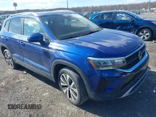 2022 Volkswagen Taos SE z VIN 3VVLX7B28NM099124, wystawiony jako IAAI lot #41615455 z przebiegiem 52 178 mil mil oraz . Historia ofert i sprzedaży dostępna na DreamBid. Obrazek 1.