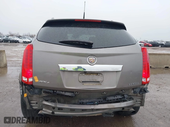 2011 Cadillac SRX Premium Collection with VIN 3GYFNFEY3BS610591, listed as a IAAI auction lot 41446148 with 147,959 mi miles. Bid and sale history available at carsss.com. Image 6.