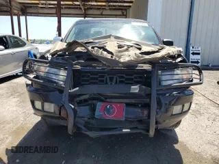 2014 Honda Ridgeline Sport with VIN 5FPYK1F73EB007015, listed as a Copart auction lot 55148465 with 131,148 mi miles and Salvage title. Bid and sale history available at DreamBid. Image 5.