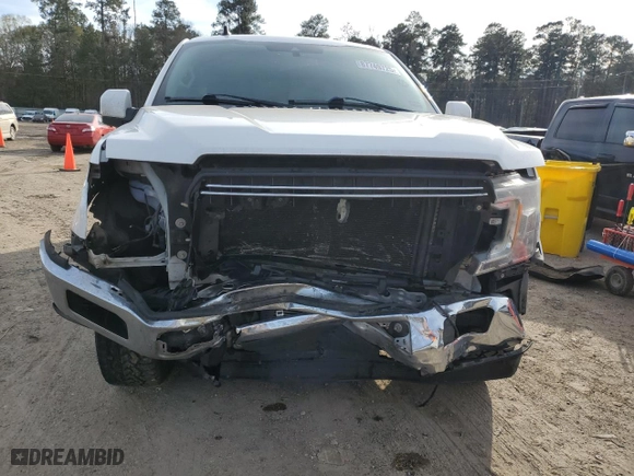2019 Ford F-150 XL with VIN 1FTFW1E11KFC63730, listed as a Copart auction lot 87749725 with 149,492 mi miles and Salvage Title. Bid and sale history available at carsss.com. Image 5.