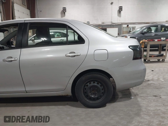 2008 Toyota Yaris with VIN JTDBT903781251568, listed as a IAAI auction lot 42090260 with 264,356 mi miles. Bid and sale history available at carsss.com. Image 14.