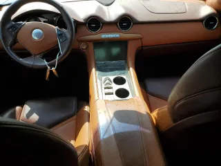2012 Fisker Karma EcoSport z VIN YH4K14AA3CA001524, wystawiony jako Copart lot #74501534 z przebiegiem 15 969 mil mil oraz Nie do naprawy. Historia ofert i sprzedaży dostępna na DreamBid. Obrazek 8.
