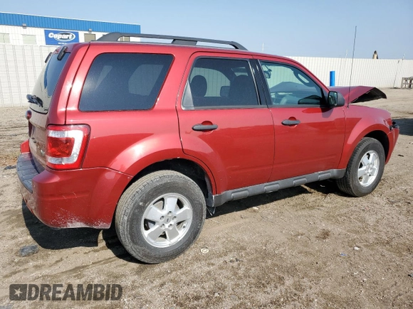 2012 Ford Escape XLT with VIN 1FMCU9DG7CKC66066, listed as a Copart auction lot 59592745 with 138,248 mi miles and Salvage title. Bid and sale history available at DreamBid. Image 3.
