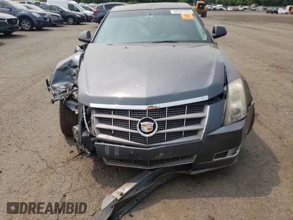 2011 Cadillac CTS Premium z VIN 1G6DS5ED1B0154694, wystawiony jako Copart lot #59187255 z przebiegiem Nie podano mil oraz Szkoda całkowita • Salvage title. Historia ofert i sprzedaży dostępna na DreamBid. Obrazek 5.