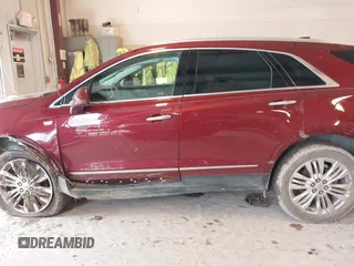 2018 Cadillac XT5 Premium Luxury AWD z VIN 1GYKNFRS6JZ114464, wystawiony jako IAAI lot #42320302 z przebiegiem 61 231 mil mil oraz . Historia ofert i sprzedaży dostępna na DreamBid. Obrazek 15.