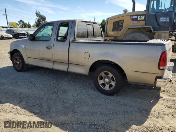 2003 Ford F-150 XL with VIN 1FTRX17L93NB77050, listed as a Copart auction lot 77107564 with 0 mi miles and Salvage Title. Bid and sale history available at carsss.com. Image 2.