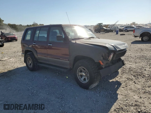 2000 Isuzu Trooper S with VIN JACDJ58X2Y7J11793, listed as a Copart auction lot 77431754 with 214,854 mi miles and Clean title. Bid and sale history available at DreamBid. Image 4.