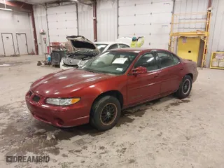 2000 Pontiac Grand Prix SE with VIN 1G2WK52J8YF319179, listed as a IAAI auction lot 41649016 with 141,813 mi miles. Bid and sale history available at carsss.com. Image 2.