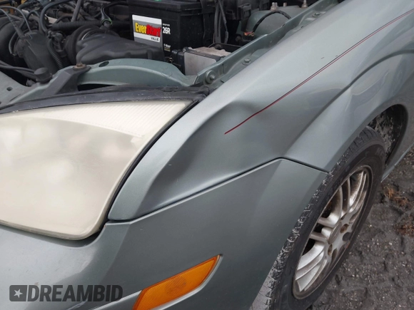 2005 Ford Focus SE with VIN 1FAHP36N65W304897, listed as a IAAI auction lot 40495173 with Not Provided miles and . Bid and sale history available at carsss.com. Image 6.