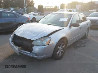 2002 Nissan Altima S with VIN 1N4AL11D72C174190, listed as a IAAI auction lot 41390812 with 171,646 mi miles. Bid and sale history available at carsss.com. Image 17.