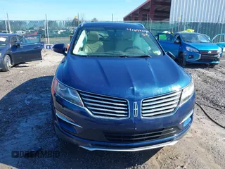 2015 Lincoln MKC with VIN 5LMTJ2AH2FUJ12531, listed as a IAAI auction lot 41639903 with 112,835 mi miles. Bid and sale history available at carsss.com. Image 12.