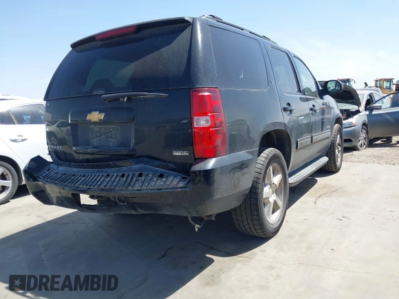 2012 Chevrolet Tahoe LT with VIN 1GNSCBE07CR229240, listed as a IAAI auction lot 41837063 with 219,901 mi miles and . Bid and sale history available at DreamBid. Image 4.