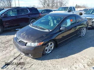 2007 Honda Civic Cpe EX with VIN 2HGFG11857H585620, listed as a IAAI auction lot 41699590 with 174,140 mi miles. Bid and sale history available at carsss.com. Image 2.