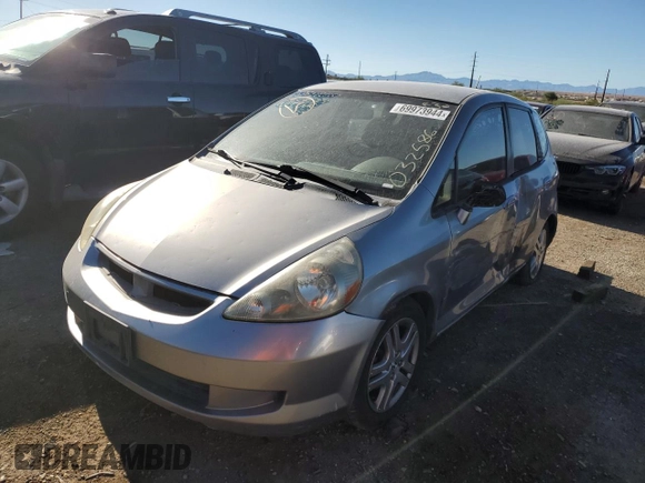 2007 Honda Fit with VIN JHMGD38447S032586, listed as a Copart auction lot 69973944 with 0 mi miles and Salvage Title. Bid and sale history available at carsss.com. Image 1.