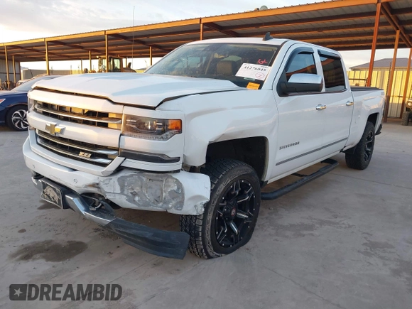2016 Chevrolet Silverado 1500 LTZ with VIN 3GCUKSEJ0GG221628, listed as a IAAI auction lot 41276045 with 153,476 mi miles. Bid and sale history available at carsss.com. Image 2.